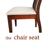 A contoured seat pan attempts to distribute weight without padding and matching the shape of the occupant's buttocks,